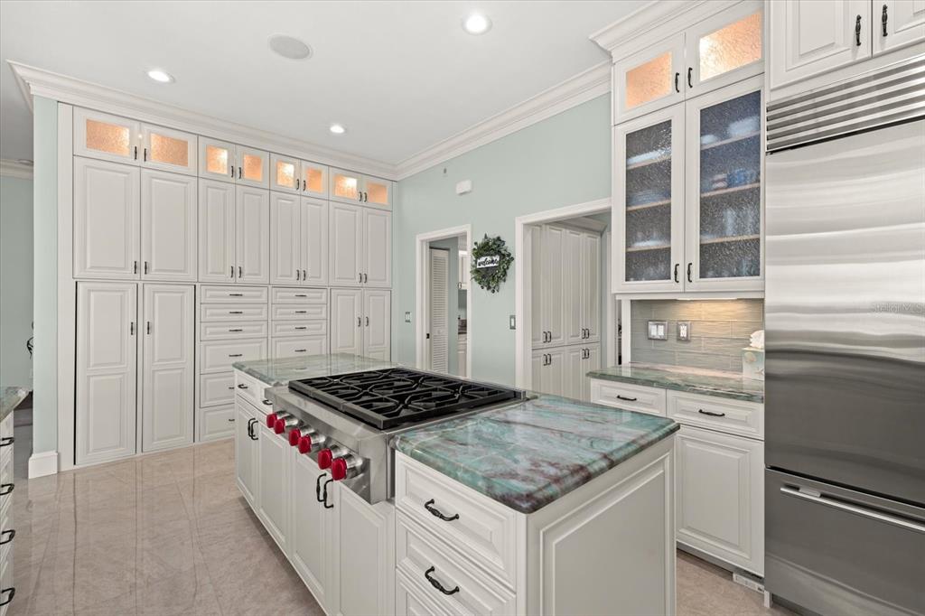 2115 Lychee Lane Nokomis, FL 34275 - Photo 41 of 85 a kitchen that has a stove and a refrigerator