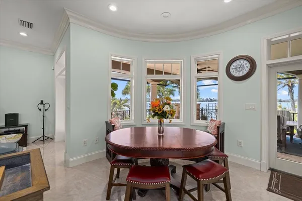 a view of a lake with a house next to a lake