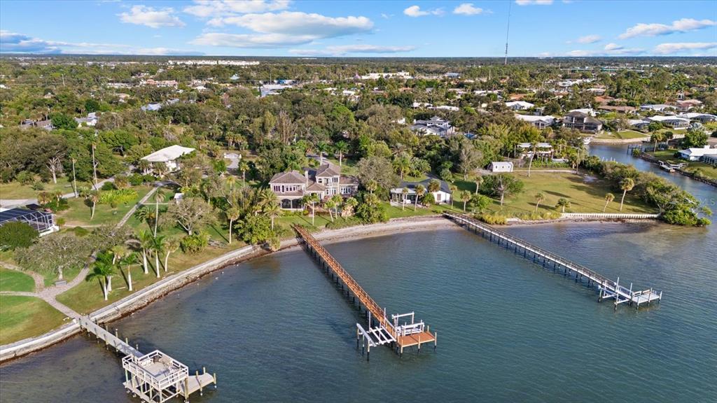 2115 Lychee Lane Nokomis, FL 34275 - Photo 82 of 85 an aerial view of a residential houses with city view
