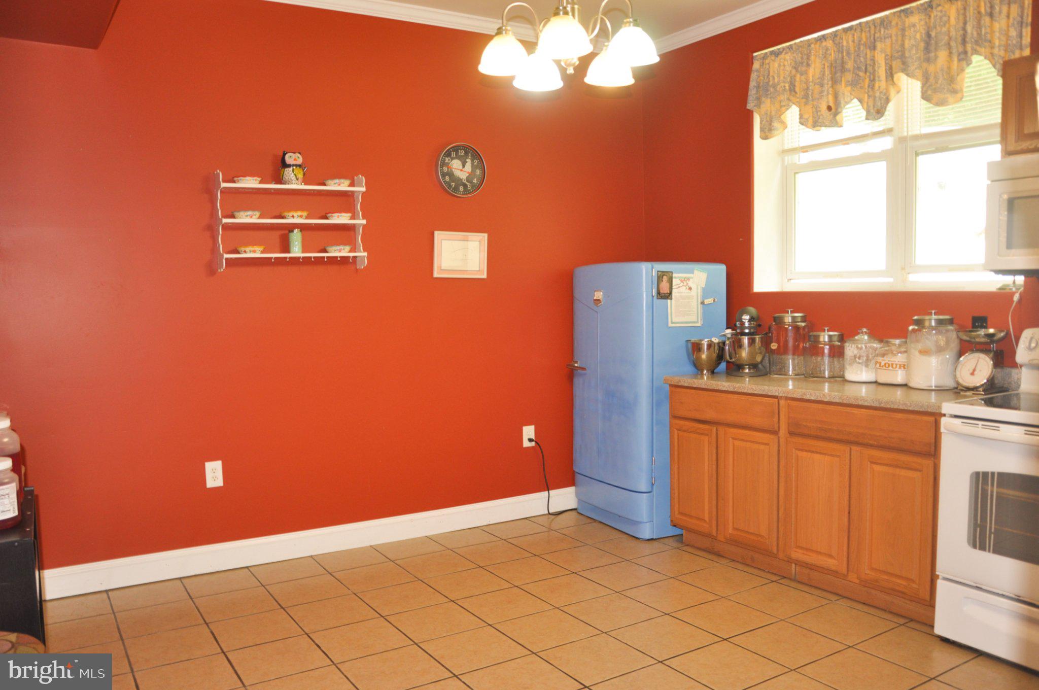321 Mount Nittany Road Lemont, PA 16851 - Photo 37 of 48 Vibrant kitchen with retro charm.
