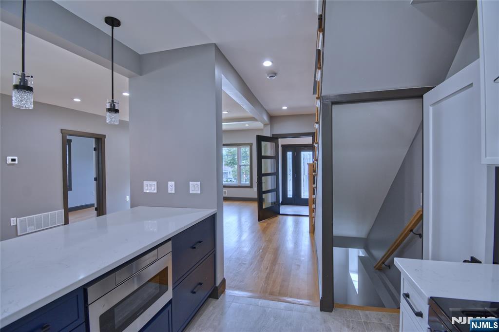 72 Hille Place Ridgefield Park, NJ 07660 - Photo 21 of 39 a view of a hallway with furniture and wooden floor