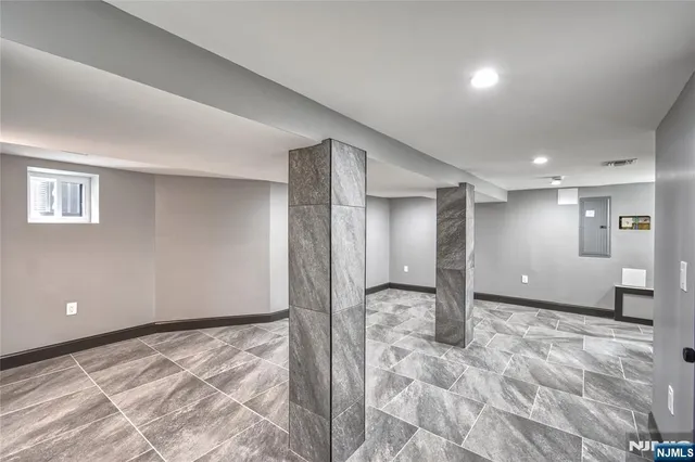 a view of a big room with a chandelier