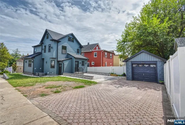 a house with trees in front of it