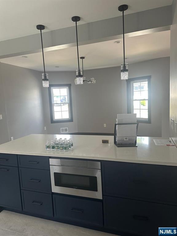 72 Hille Place Ridgefield Park, NJ 07660 - Photo 27 of 39 a kitchen with a sink a counter space and appliances