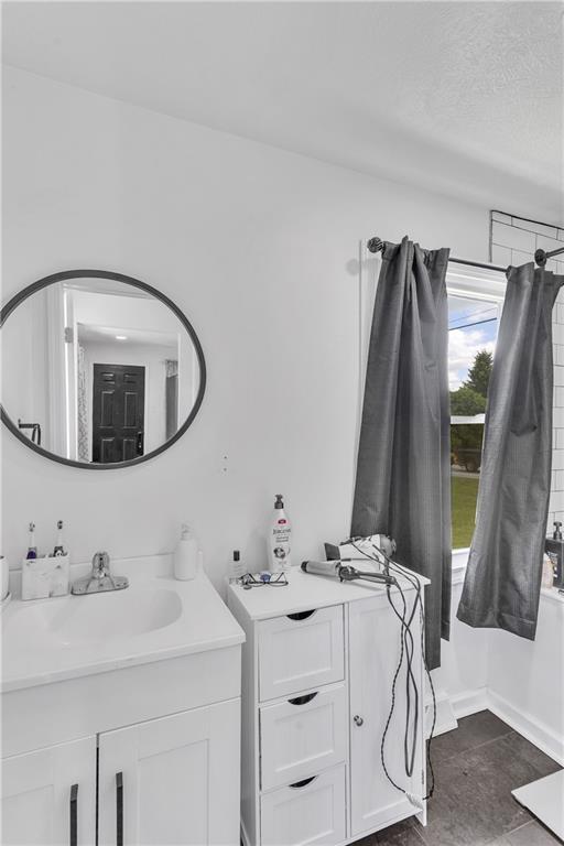 1747 Galilee Road Wampum, PA 16157 - Photo 11 of 32 Bright and functional, the bathroom offers a refreshing space for daily routines.