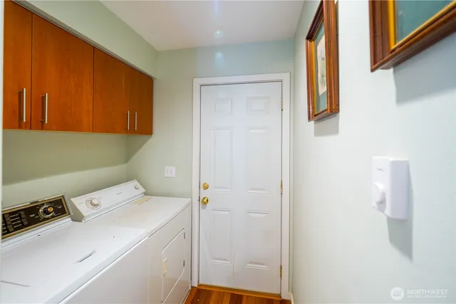 a utility room with dryer and washer