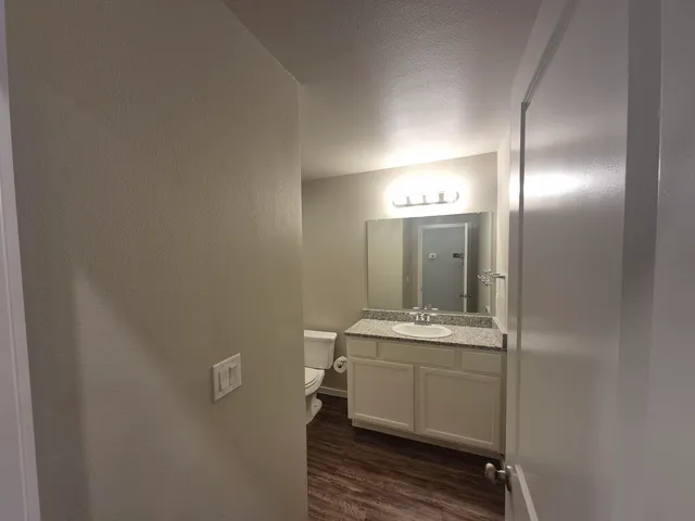 a bathroom with a sink and mirror