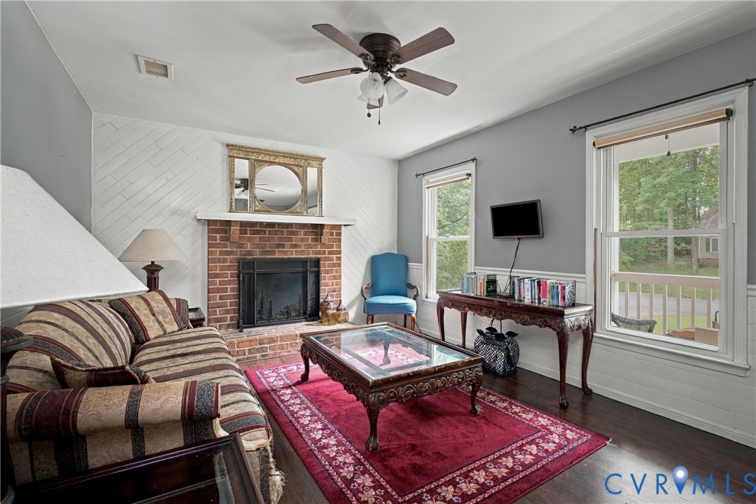 7224 Full Rack Drive Midlothian, VA 23112 - Photo 6 of 36 Brick fireplace with a white mantel, wood-finish f