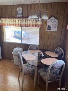 3003 Hualapai Mountain Road, Unit 29 Kingman, AZ 86401 - Photo 11 of 30 a dining room with furniture and wooden floor