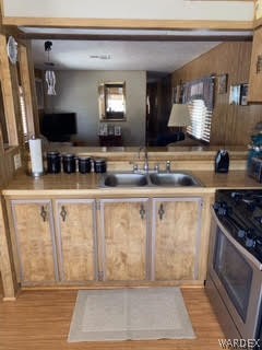 3003 Hualapai Mountain Road, Unit 29 Kingman, AZ 86401 - Photo 14 of 30 a kitchen with stainless steel appliances granite countertop a sink and a stove