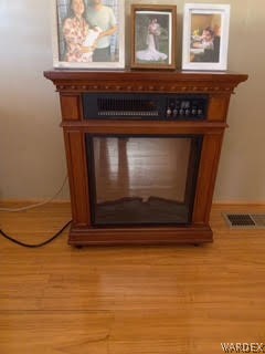 3003 Hualapai Mountain Road, Unit 29 Kingman, AZ 86401 - Photo 16 of 30 a view of fireplace with wooden floor