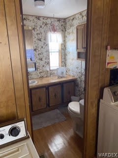 3003 Hualapai Mountain Road, Unit 29 Kingman, AZ 86401 - Photo 20 of 30 a bathroom with a sink a toilet and shower
