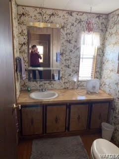 3003 Hualapai Mountain Road, Unit 29 Kingman, AZ 86401 - Photo 22 of 30 a bathroom with a sink and a mirror