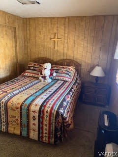 3003 Hualapai Mountain Road, Unit 29 Kingman, AZ 86401 - Photo 24 of 30 a bedroom with a bed and a table in it