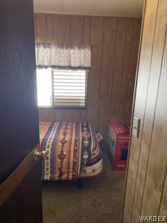 3003 Hualapai Mountain Road, Unit 29 Kingman, AZ 86401 - Photo 27 of 30 a bed sitting in a room next to a window