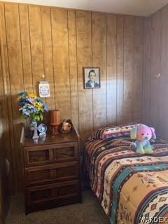 3003 Hualapai Mountain Road, Unit 29 Kingman, AZ 86401 - Photo 28 of 30 a bedroom with a bed and a potted plant