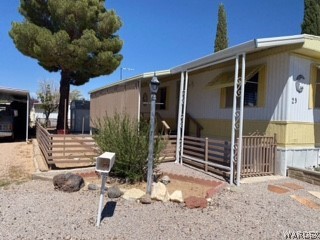 3003 Hualapai Mountain Road, Unit 29 Kingman, AZ 86401 - Photo 3 of 30 a front view of a house with garden