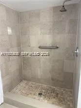 a view of a double vanity sink and a mirror