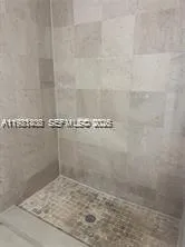 a kitchen with a sink and a stove