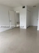 a view of a car parked in front of a building