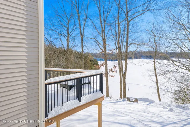 a view of a balcony with trees