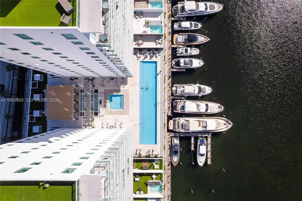 a view of hall way with furniture