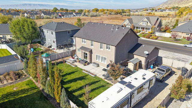 368 East 700 North Springville, UT 84663 - Photo 46 of 55 Aerial view of residential area with a mountain backdrop