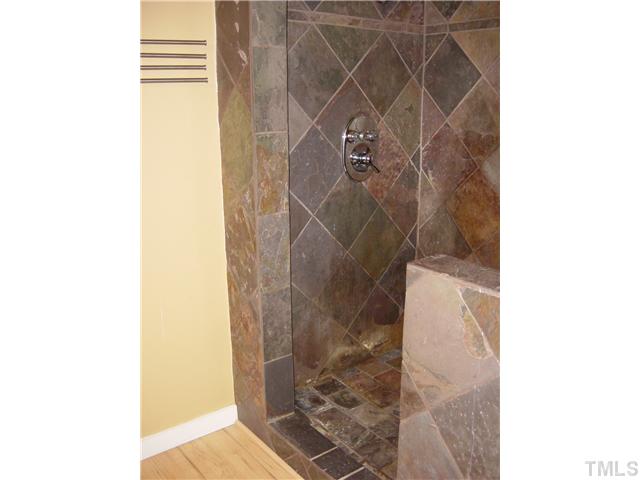 4808 Gun Powder Place Raleigh, NC 27616 - Photo 11 of 23 a bathroom with a shower