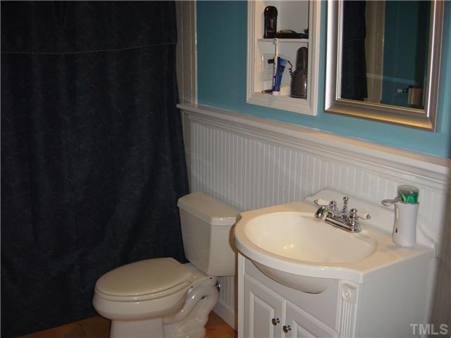 4808 Gun Powder Place Raleigh, NC 27616 - Photo 15 of 23 a bathroom with a sink and a toilet