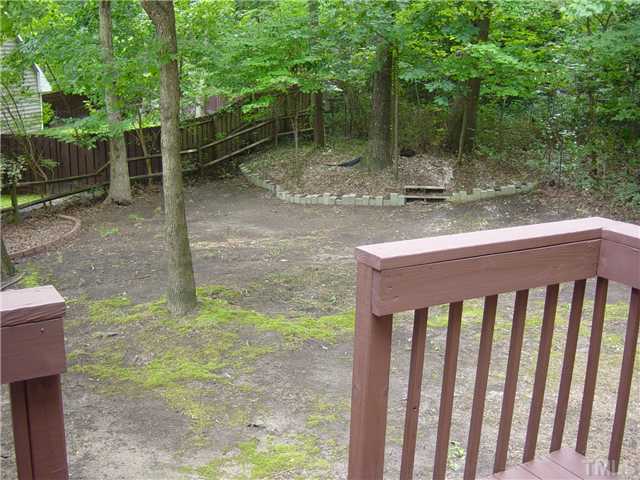 4808 Gun Powder Place Raleigh, NC 27616 - Photo 20 of 23 a view of a backyard with trees