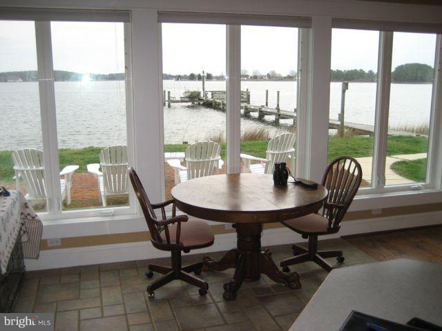 1612 Deep Point Road Woolford, MD 21677 - Photo 12 of 30 a view of a dining room with furniture and window