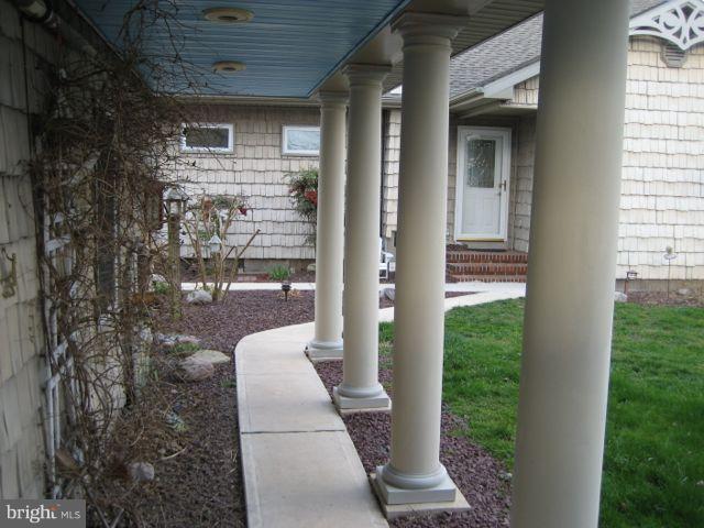 1612 Deep Point Road Woolford, MD 21677 - Photo 24 of 30 a porch with seating space and yard