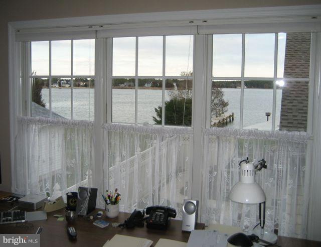 1612 Deep Point Road Woolford, MD 21677 - Photo 26 of 30 a room with a window and furniture