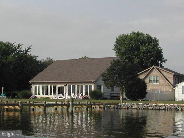 1612 Deep Point Road Woolford, MD 21677 - Photo 30 of 30 a front view of a house with a boat