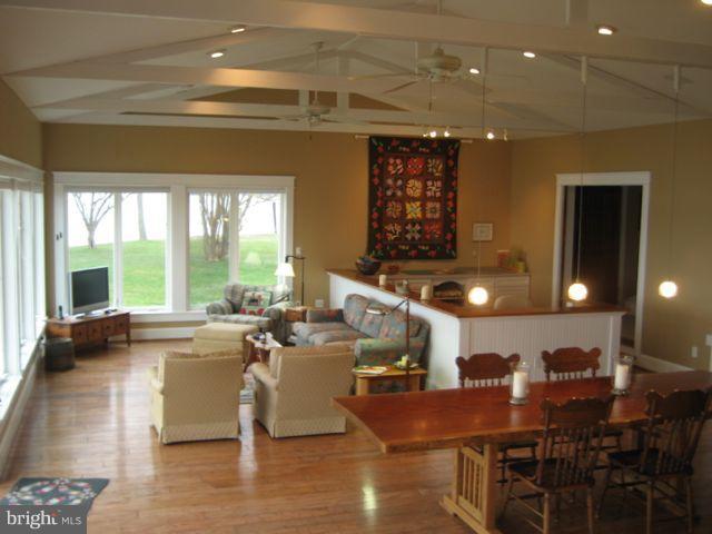 1612 Deep Point Road Woolford, MD 21677 - Photo 4 of 30 a view of a dining room with furniture window and outside view