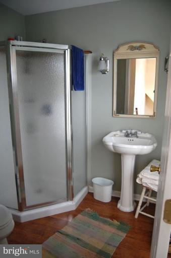 1612 Deep Point Road Woolford, MD 21677 - Photo 7 of 30 a bathroom with a sink toilet and shower