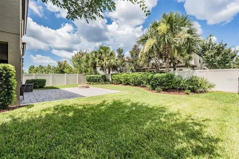 an aerial view of a house with a swimming pool