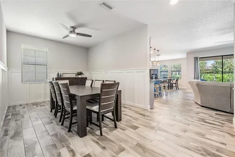 a view of a dining room with furniture