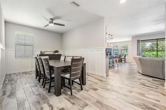a view of a dining room with furniture