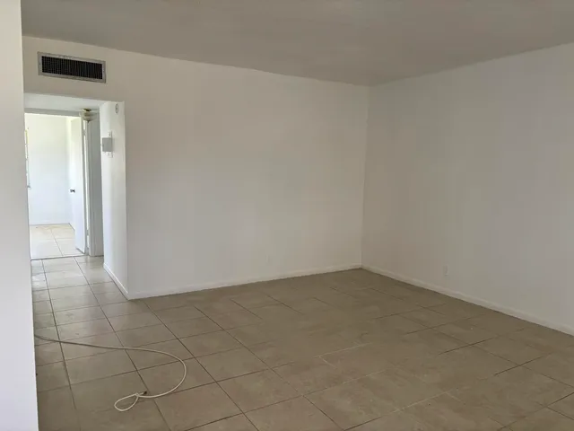 an empty room and a window