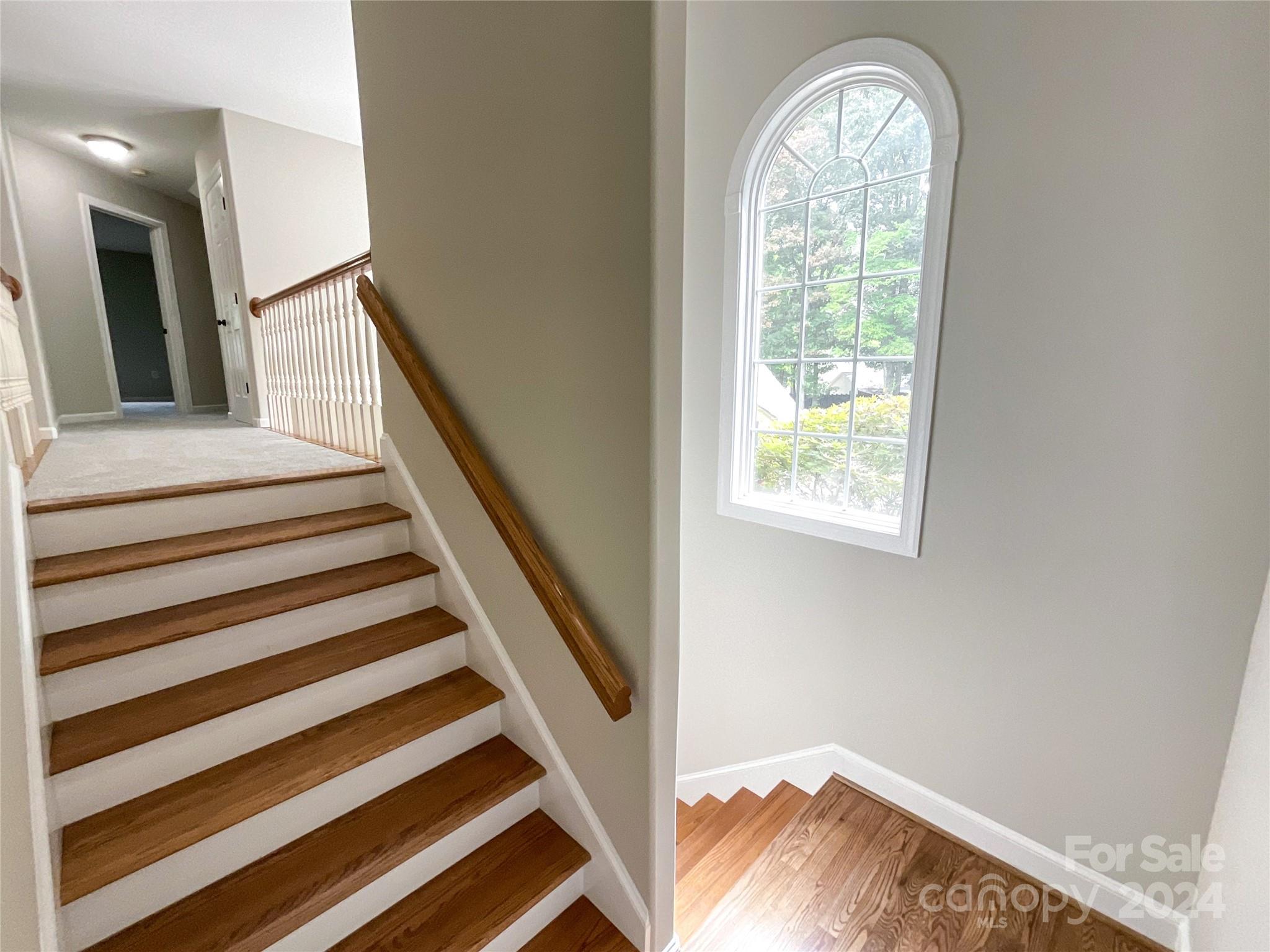 2510 Doster Road Monroe, NC 28112 - Photo 24 of 48 a view of entryway with wooden floor and a front door