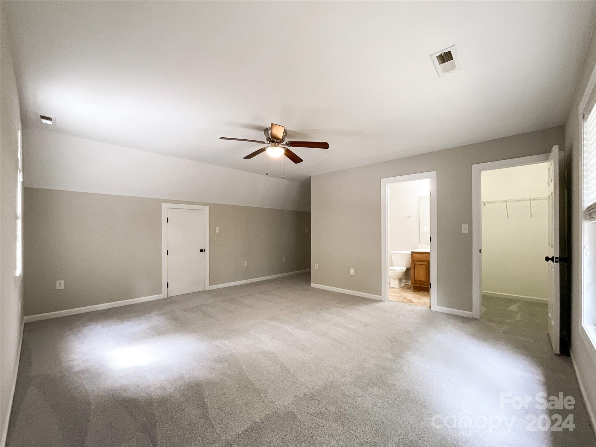 2510 Doster Road Monroe, NC 28112 - Photo 25 of 48 a view of a livingroom with a ceiling fan and window