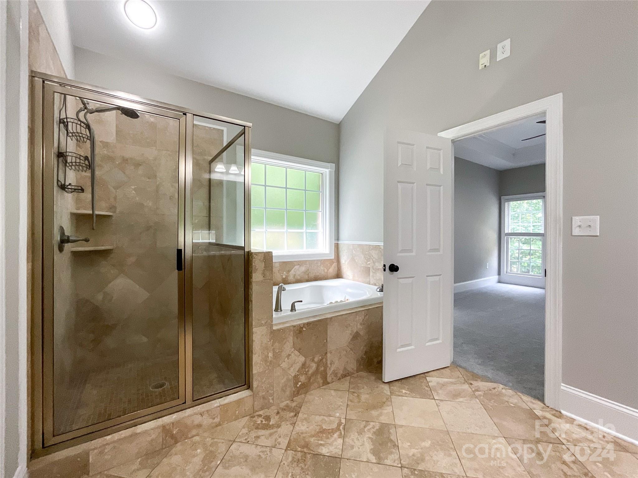 2510 Doster Road Monroe, NC 28112 - Photo 33 of 48 a bathroom with a tub shower and sink