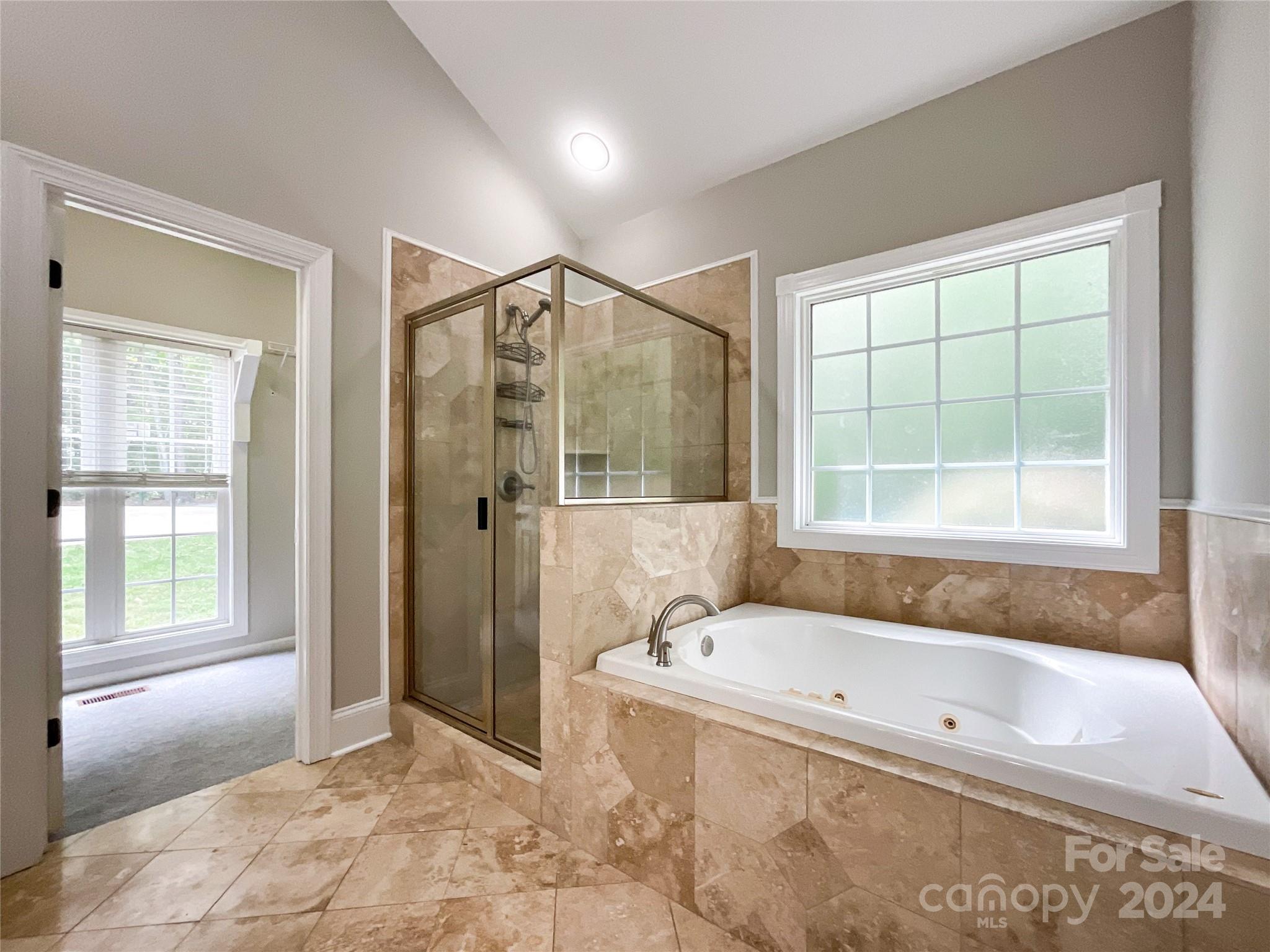 2510 Doster Road Monroe, NC 28112 - Photo 34 of 48 a bathroom with a bathtub and shower