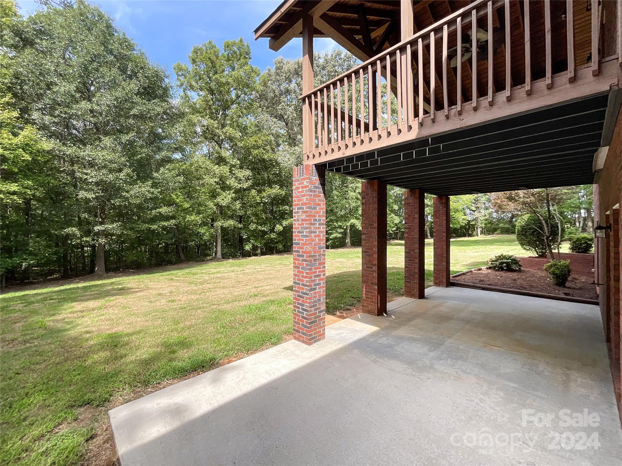 2510 Doster Road Monroe, NC 28112 - Photo 46 of 48 a view of a house with backyard and porch