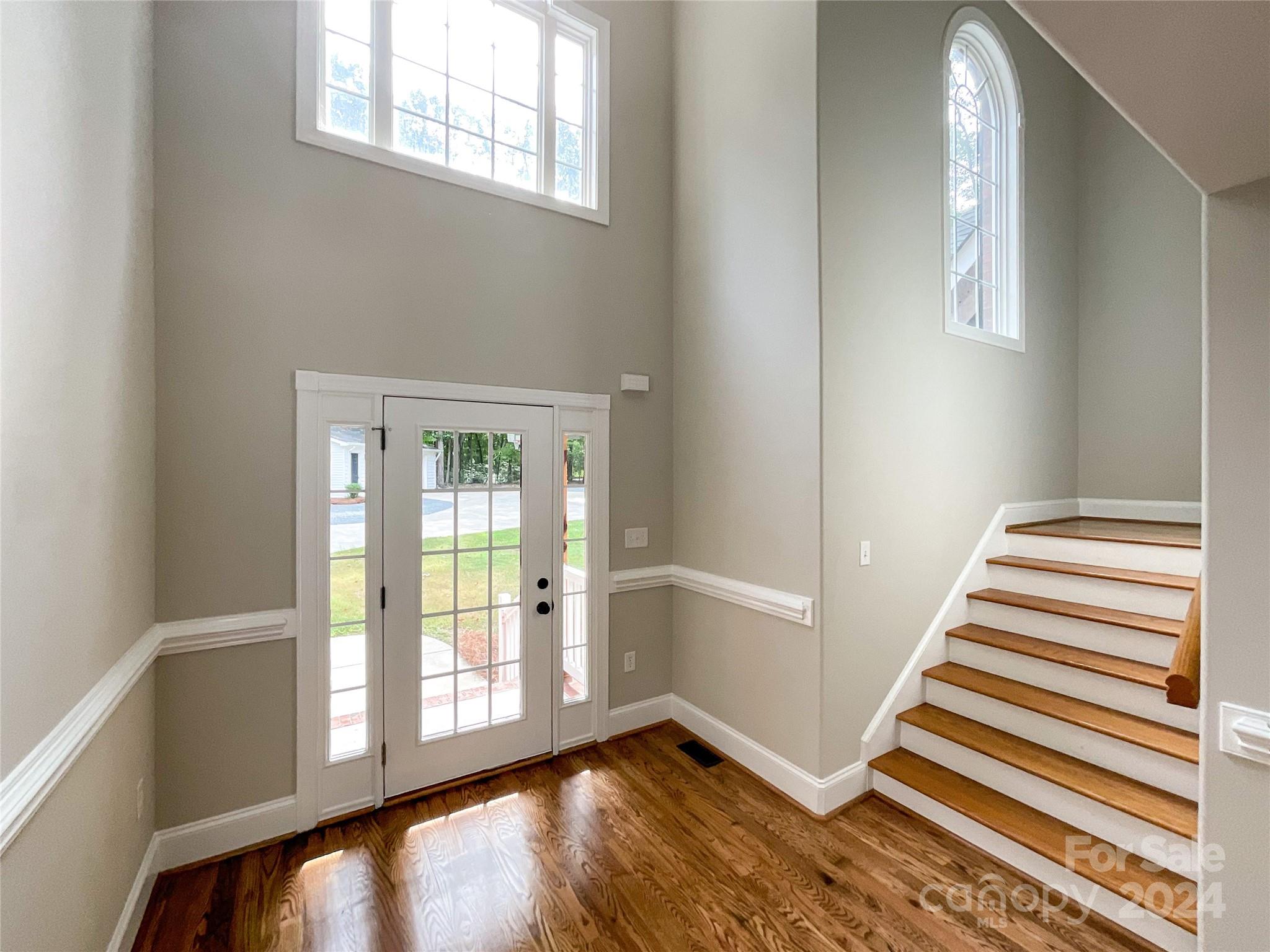 2510 Doster Road Monroe, NC 28112 - Photo 5 of 48 a view of an empty room with wooden floor and a window