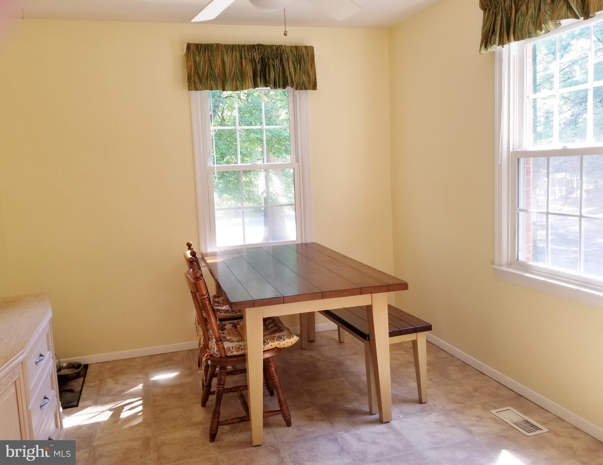 A table and 6 chairs will fit easily.