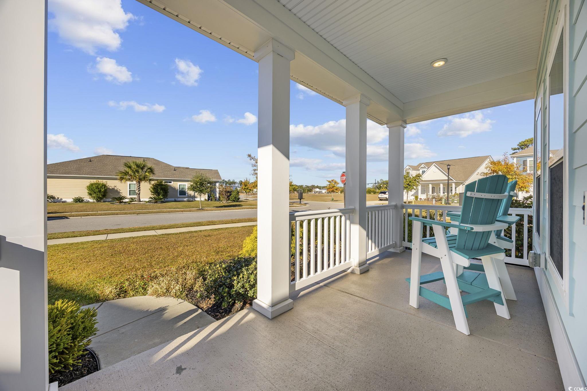 993 Mourning Dove Drive Myrtle Beach, SC 29577 - Photo 4 of 38 Covered porch featuring a residential view