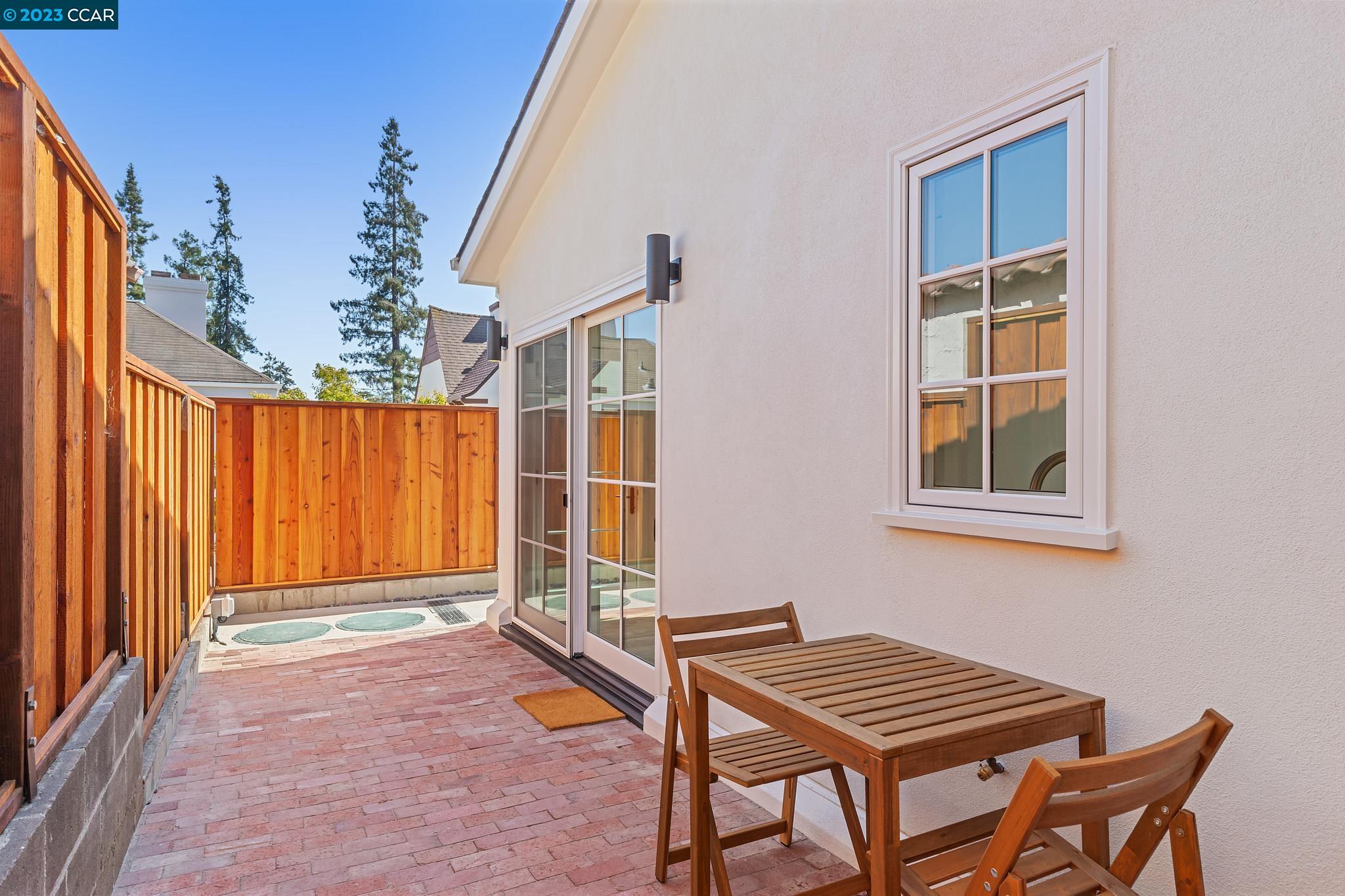 833 Paramount Road Oakland, CA 94610 - Photo 14 of 15 a backyard of a house with outdoor seating