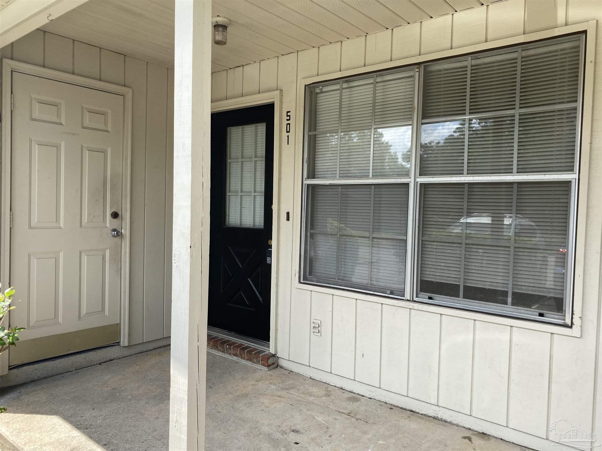 6288 Hamilton Bridge Road, Unit 501 Milton, FL 32570 - Photo 2 of 12 a view of a gate with a door